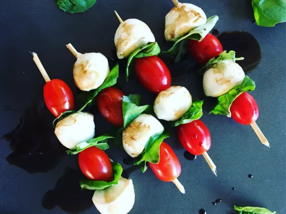 Cheese, Tomato, Basil sticks. 