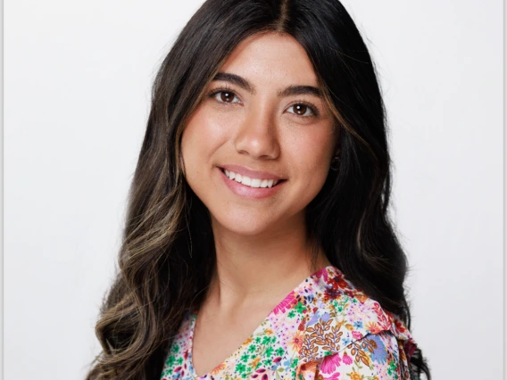 Person with colorful flower shirt headshot