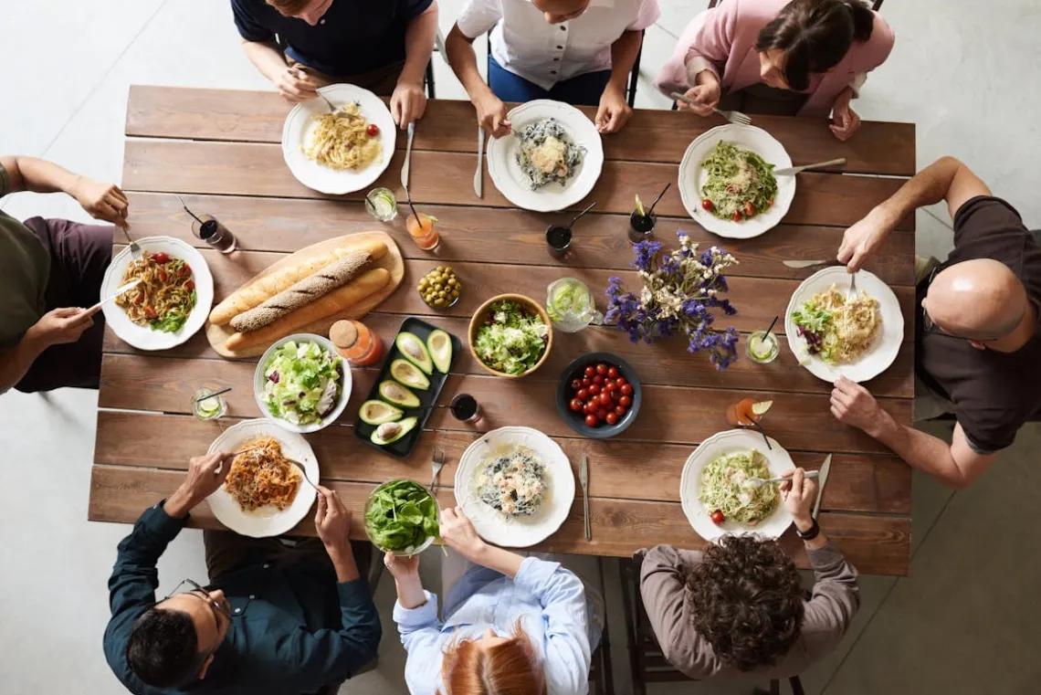 Group of people eating together